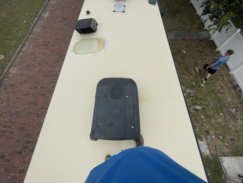 The same roof cleaned to an even off-white finish